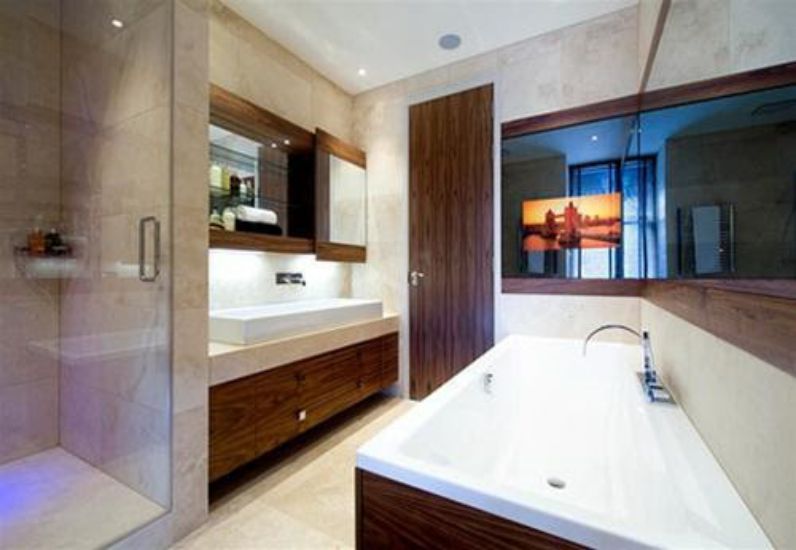 Thiết kế phòng tắm tương lai sử dụng nội thất tivi